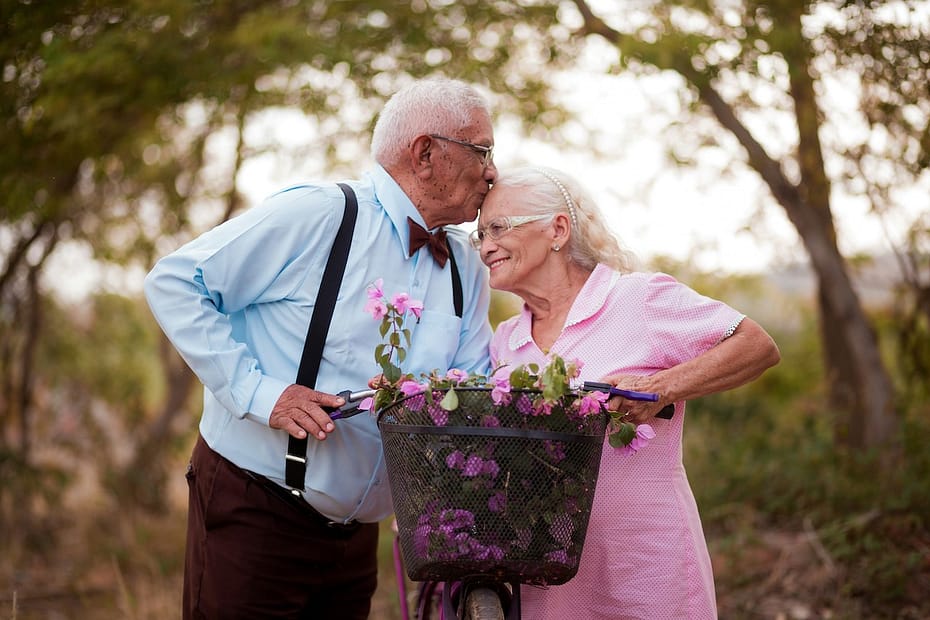 A happy retired couple enjoying retirement; pension income should be reported to HMRC using the SA101 form.