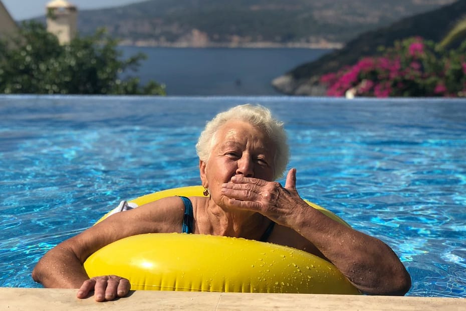 Older woman by the sea, reflecting retirement questions like do you pay national insurance on a pension.